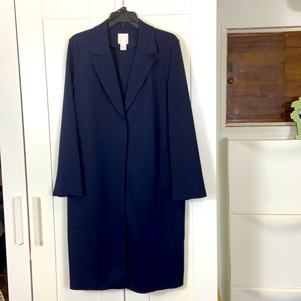 Light weight coat in Navy Blue.